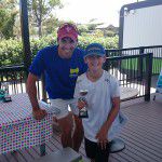 Hot Shots Green Ball Champion Will Storrs with Morningside Tennis Centre Head Coach Paul Gibson